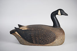 Canada goose by Harry "Spud" Norman of Wolfe Island, Ontario with incredibly detailed feather carving and raised wingtips. A spectacular piece of folk art!