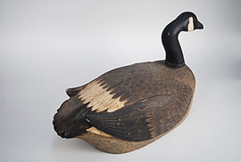 Canada goose by Harry "Spud" Norman of Wolfe Island, Ontario with incredibly detailed feather carving and raised wingtips. A spectacular piece of folk art!