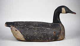 Early Canada goose by an unknown Crisfield, Maryland decoy maker, ca. 1920. Carved wing delineation and carved eyes. E.C. Dize is painted on the bottom. Wonderful piece of Eastern Shore folk art.