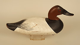 Two drake canvasbacks by Charlie Joiner of Chestertown, Maryland. Both are fine examples of his early gunning decoys with wide bills and a hint of a Roman nose. One is signed and dated 1959 and the other is singed and dated 1962.