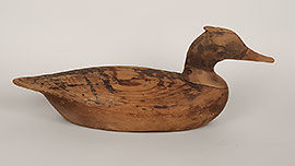 
Red-breasted merganser from Seaford, Long Island, New York, ca. 1900. Classic Long Island merganser worn to traces of original paint with a Mackey collection stamp on the bottom. 
