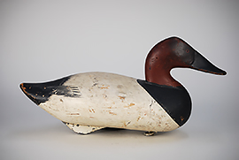 Early canvasback, ca. 1940, by Madison Mitchell in strong original paint and a mellow patina. 