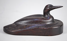 Miniature loon by General Chet DeGavre of Onancock, Virginia, carved from one piece of wood.