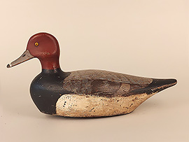 Redhead by an unknown maker from Upstate New York, ca. 1890. This is one of the decoys that Harvey Stevens warned were being sold under his name. "H.A. Stevens" cold-stamped into the body. Perfect original paint.