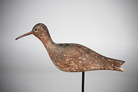 Running curlew by an unknown Massachusetts maker, branded "Pack." Barely a trace of paint but exquisite form.