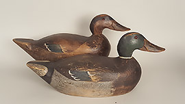 Pair of hollow-carved mallards by Mike Shurada of Prairie du Chien, Wisconsin, ca. 1930s. Nice original paint with a wonderful dry surface patina.
