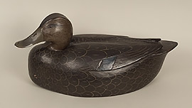 Black duck by Turk Libensperger of Trenton, New Jersey, ca. 1960s. Excellent carving and painting detail with incised speculums.